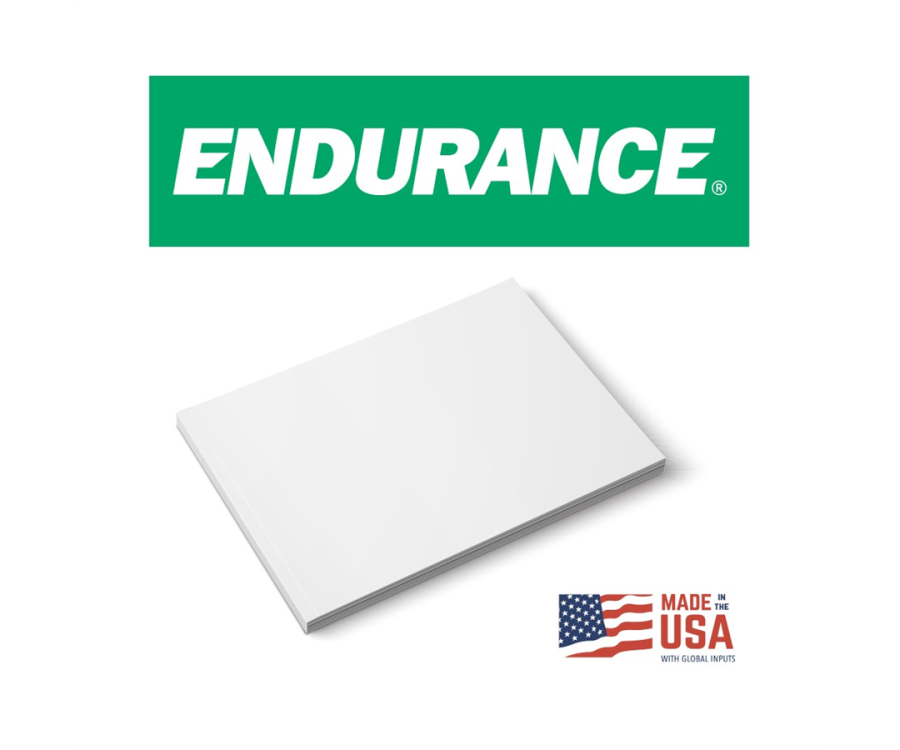 A stack of white paper sheets next to a Made in the USA label with a green banner above displaying the word Endurance. 10735718